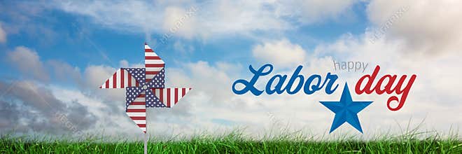 Happy labor day text and USA wind catcher in front of grass and sky