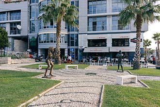 Sculptures of rock stars on a small avenue in the city Durres. A
