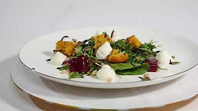 Cucumber salad with grilled tuna. Arugula and Beet Salad with Goat Cheese and Candied Nuts. Salad of lettuce, beetroot