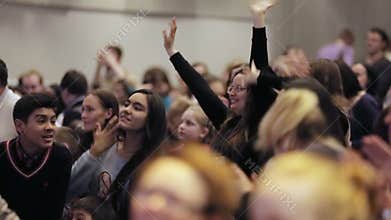 Grateful audience giving loud applause