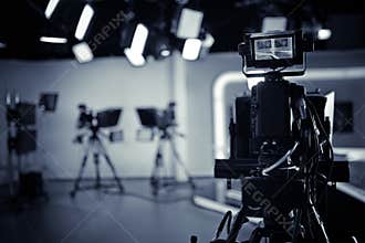 TV Studio live broadcasting.Recording show.TV NEWS program studio with video camera lens and lights