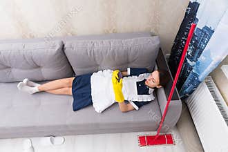 Lazy work shy housekeeper taking a break