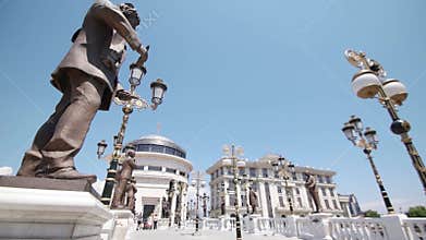 SKOPJE MACEDONIA - JULY 2015: People walking on bridge with full of statues and arts