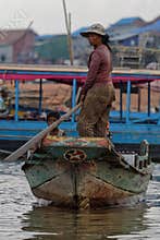 Woman and boy, Tonle Sap, Cambodia