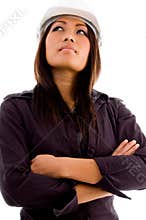 Young architect wearing helmet and posing