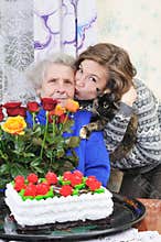 Girl with elderly woman