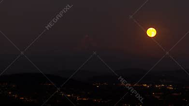 UHD 4k timelapse movie of long exposure moonrise over city of Portland Oregon with mount Hood