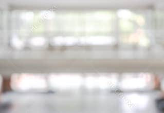 Office building lobby hall blur background or blurry school hallway corridor interior view looking toward empty corridor entrance