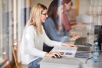 Group of girls working on computers