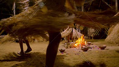 Traditional indigenous ceremony in the jungle by night