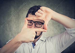 Man framing a perfect shot