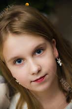 Blue eyed white caucasian young girl portrait