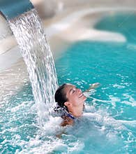 Spa hydrotherapy woman waterfall jet