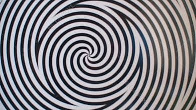 Optical illusion of spinning black and white circles.