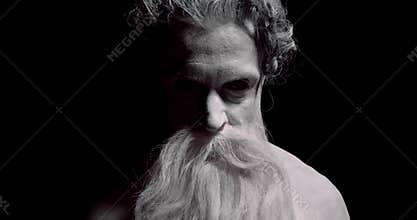 Close up of the face of an ancient greek God with long beard, statue, 4k