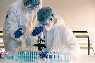 Scientists and researcher doing research for finding coronavirus, covid-19 vaccine disease