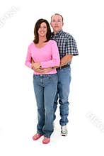 Casual Couple Standing Together Over White