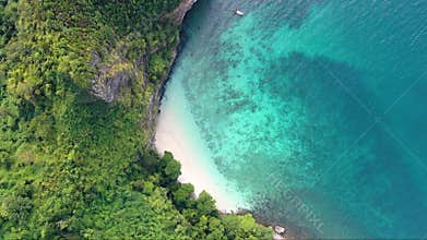 Nature of green island beach with boat on sea aerial view