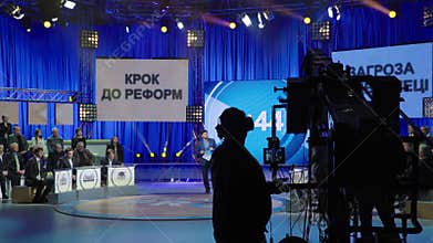 The camera on the crane in a TV studio during the recording TV