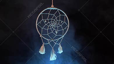 Dream catcher surrounded by cold smoke. curse, witchcraft and magic.