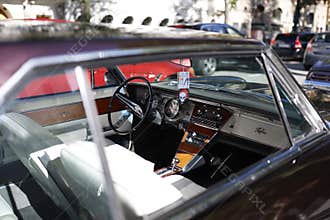 Buick Riviera interior, really nice white leather and a old steering wheel