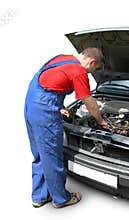 Mechanic fixing car engine