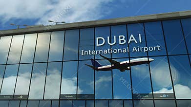Airplane landing at Dubai United Arab Emirates airport mirrored in terminal