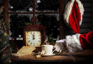 Santa Reaching for Warm Drink at Midnight