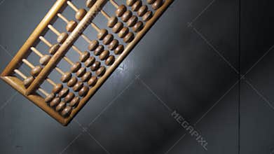 sempoa. Made of wood. The abacus is rotating slowly.