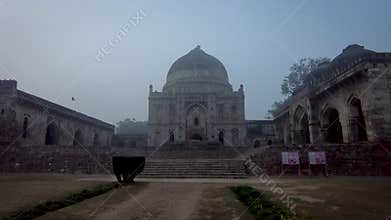 Morning full view of Bara gumbad and three domed mosque, Lodi garden, Delhi