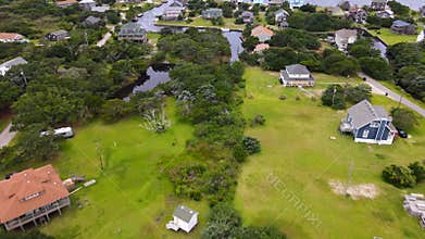 An aerial view of the town of Avon, North Carolina, the houses, canals and roads of the town.