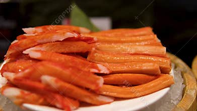Crab sticks, aka imitation crab or surimi, mimic crab meat in taste, texture, and appearance. They're made from