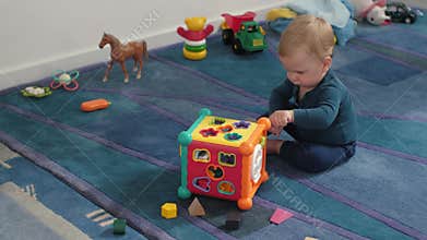 Baby exploring sorting toy
