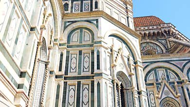 Florence Cathedral marble facade with arched windows, Florence Italy