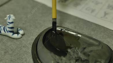 Close shot of Chinese Calligraphy writing