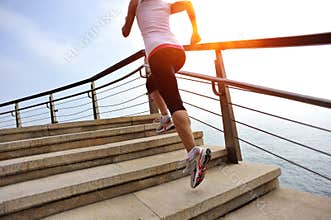 Healthy lifestyle woman legs running on stone stai