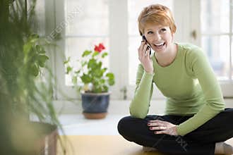 Smiling woman on cell phone