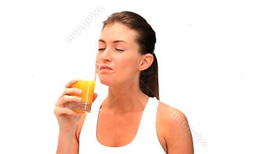 Woman drinking a orange juice