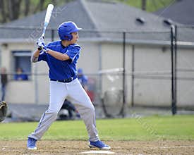 Teen baseball batter