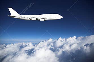 Jumbo jet above clouds