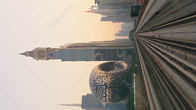 UAE, Dubai, 15 November 2024: view from a subway in motion to Museum of the Future at sunset, roads among skyscrapers