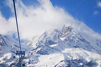 Tram on snow mountains