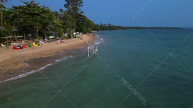 Hammock swing in water at Beach, Lush Greenery. Amazing aerial view flight drone