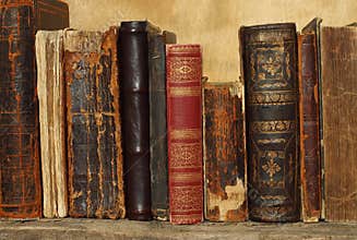 Ancient books on wooden background