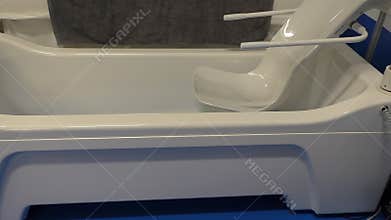 Demonstration of modern bath for disabled people