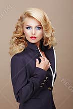 Charisma. Businesslike Woman Blonde in Blue Suit