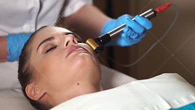 Mesoporation procedure. Woman at the beautician.