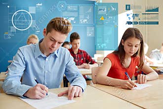 Group of students with books writing school test