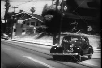 Police car chasing vehicle on street