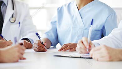 Group of doctors at meeting in hospital